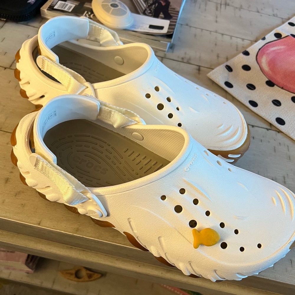 CROCS White and Tan Clogs with Fish Charm